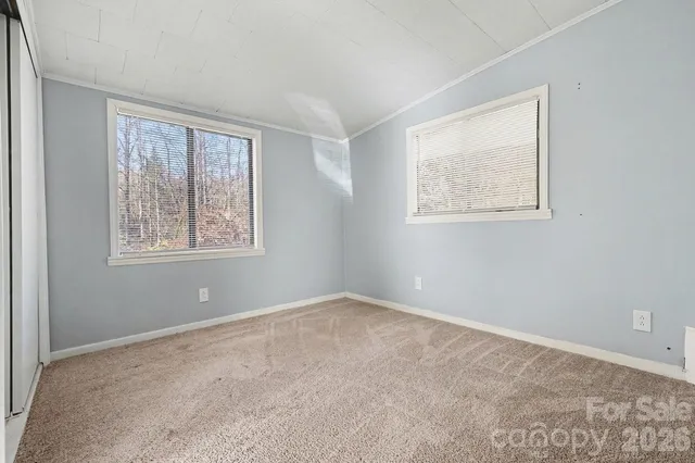 an empty room with windows