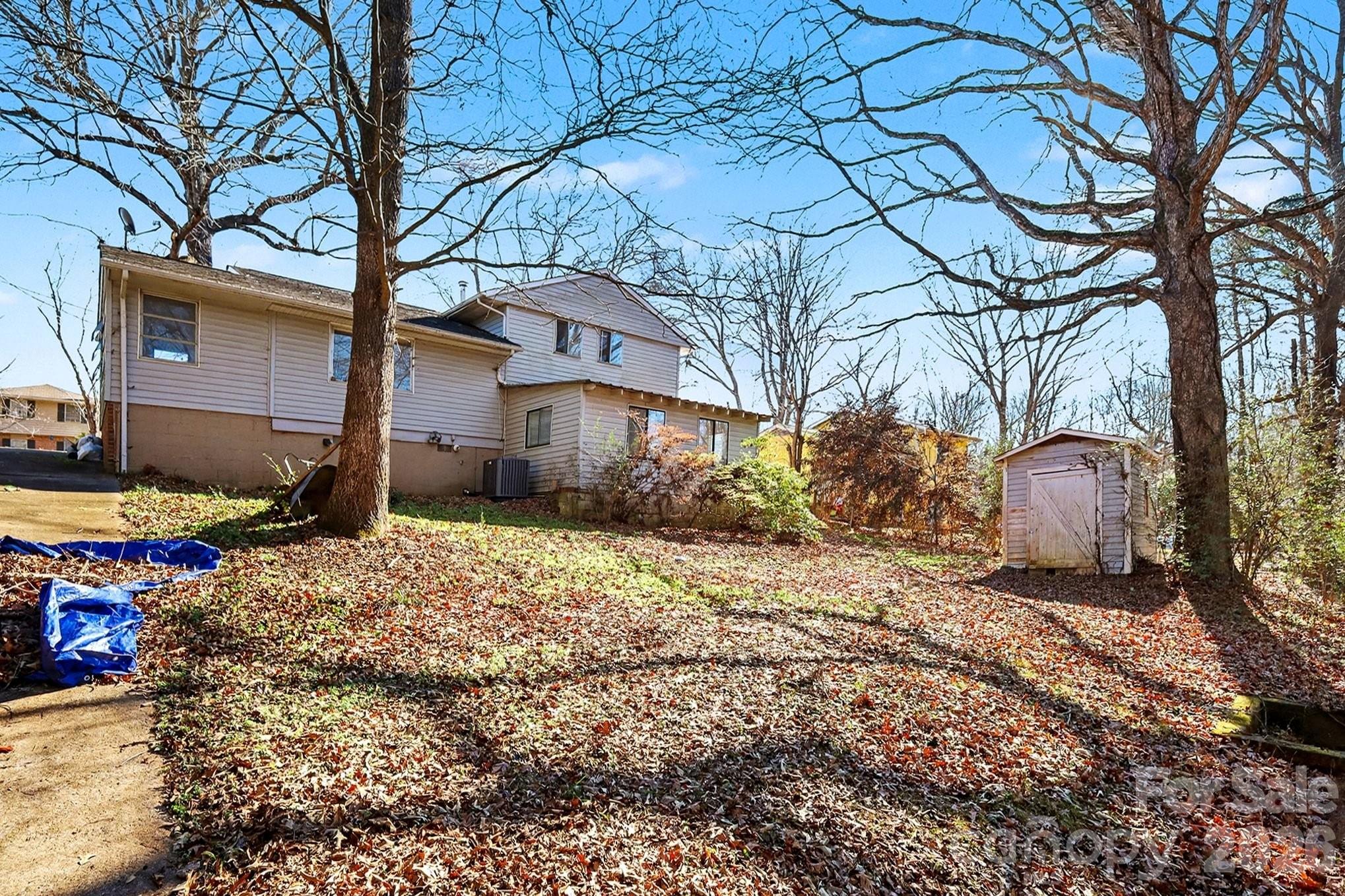 2601 Devon Drive Dallas, NC 28034 - Photo 4 of 35 a backyard of a house with lots of green space