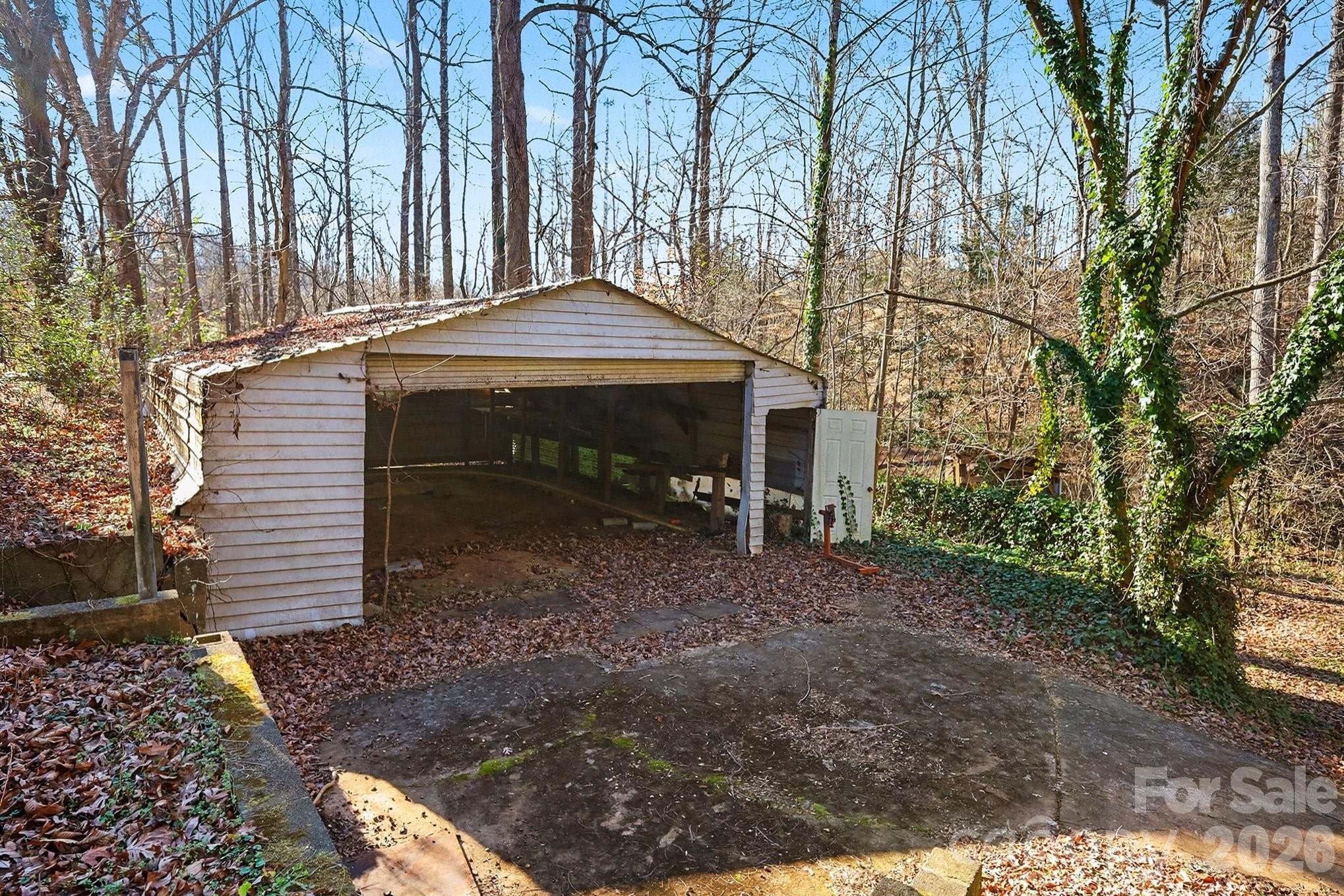 2601 Devon Drive Dallas, NC 28034 - Photo 6 of 35 a view of a house with a yard and large tree