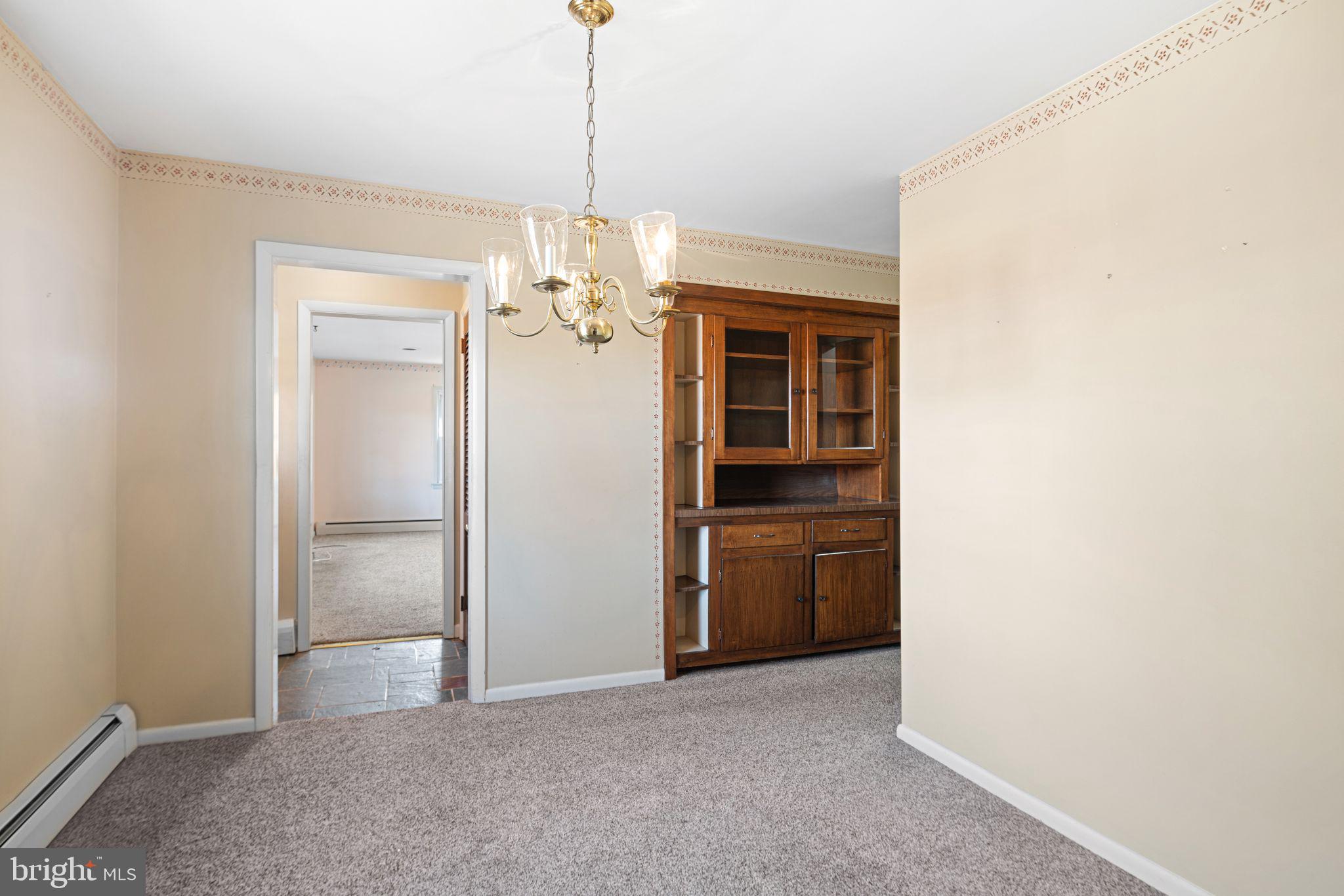 204 Linden Avenue Pitman, NJ 08071 - Photo 6 of 15 a view of a kitchen with a sink and refrigerator