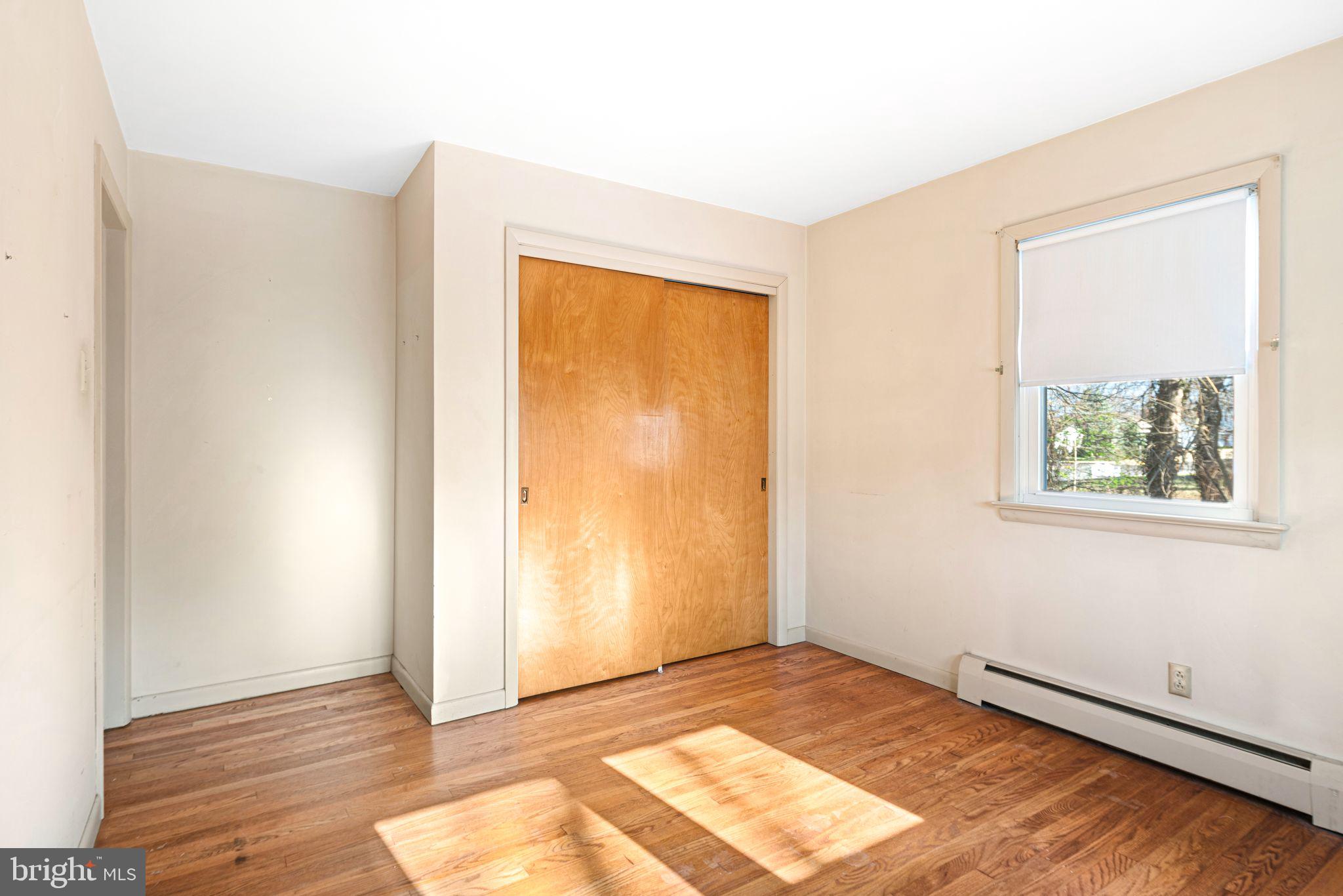 204 Linden Avenue Pitman, NJ 08071 - Photo 9 of 15 a view of an empty room and window