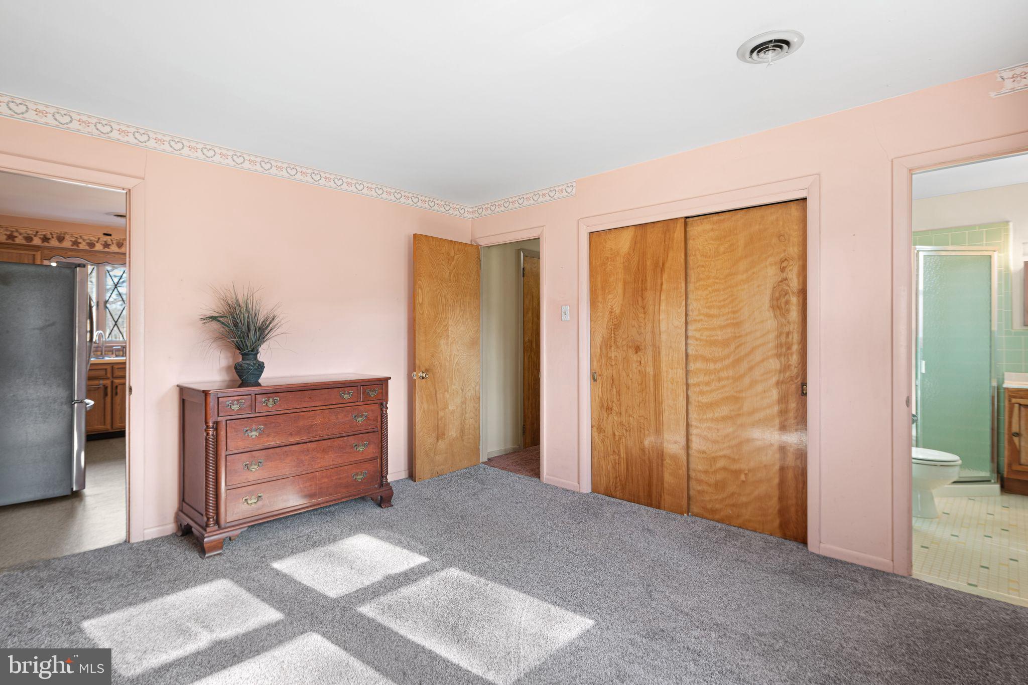 204 Linden Avenue Pitman, NJ 08071 - Photo 10 of 15 a room with a dresser and a window