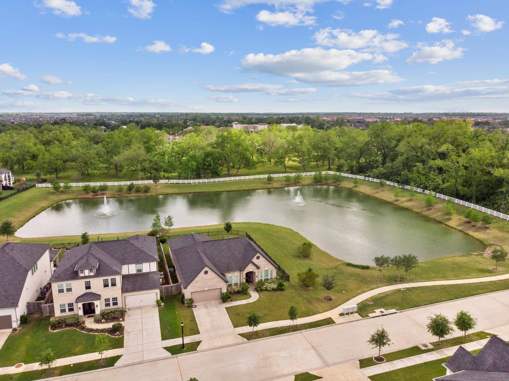 4227 Carol Ridge Drive Sugar Land, TX 77479 - Photo 3 of 35 a view of a swimming pool and lake view