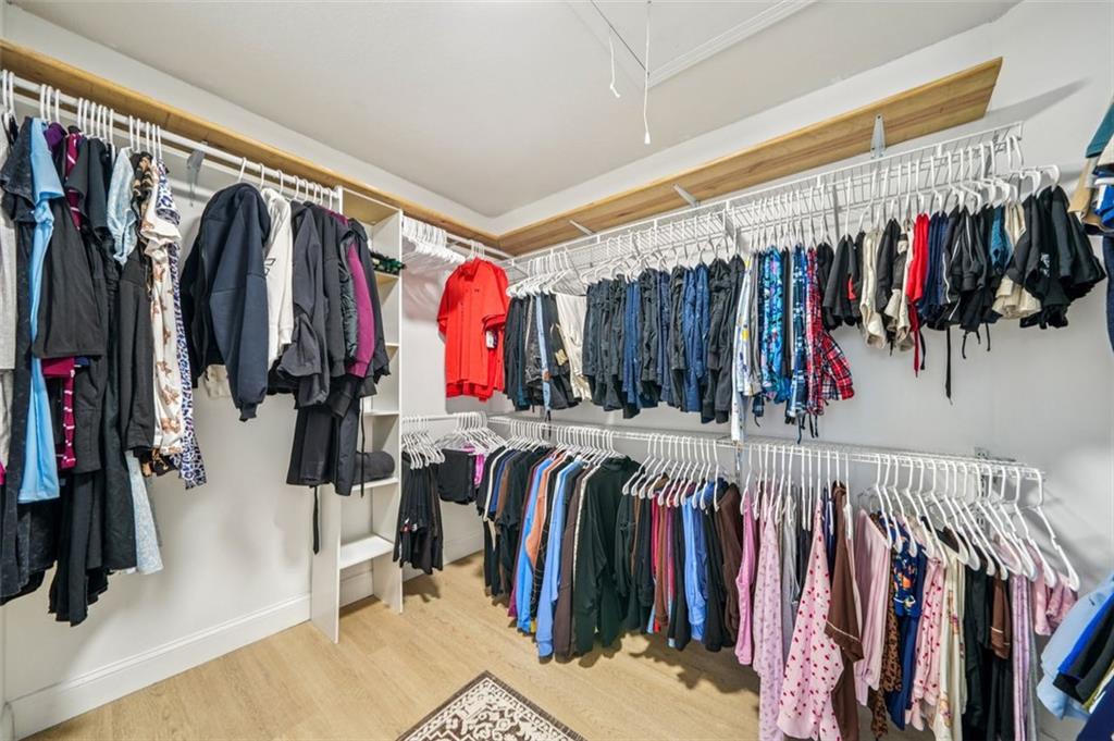 198 Celestial Run Winder, GA 30680 - Photo 14 of 30 a view of walk in closet with clothes