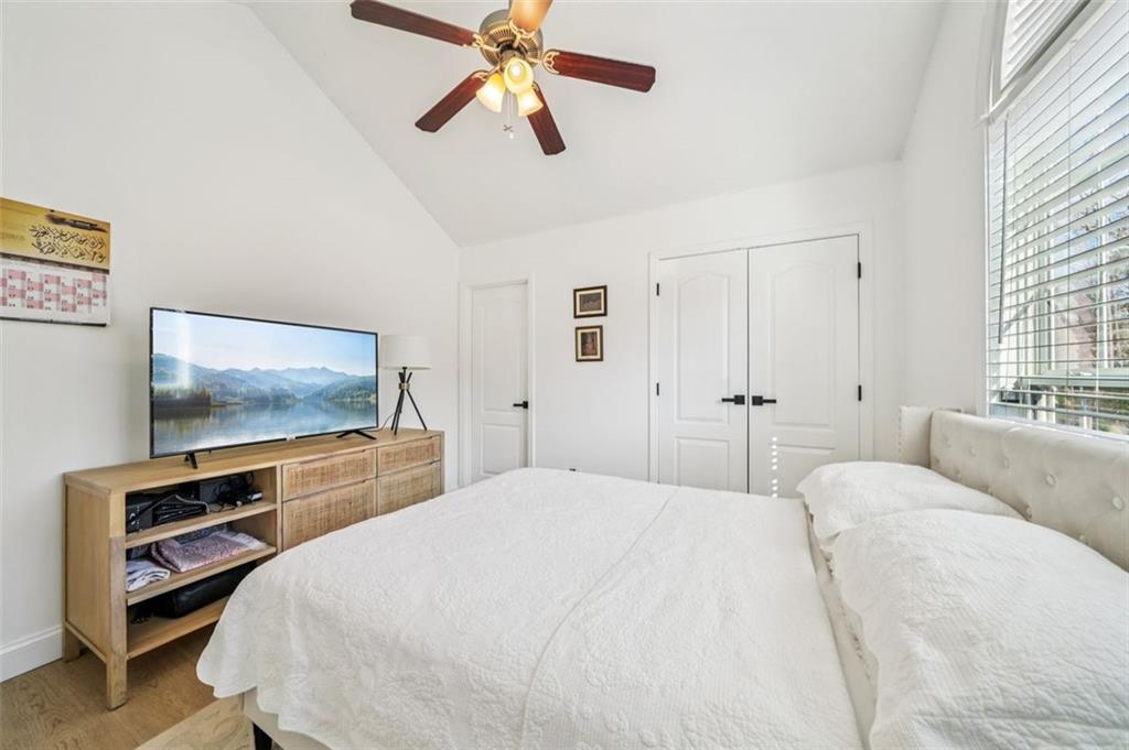 198 Celestial Run Winder, GA 30680 - Photo 17 of 30 a bedroom with a bed and a flat screen tv