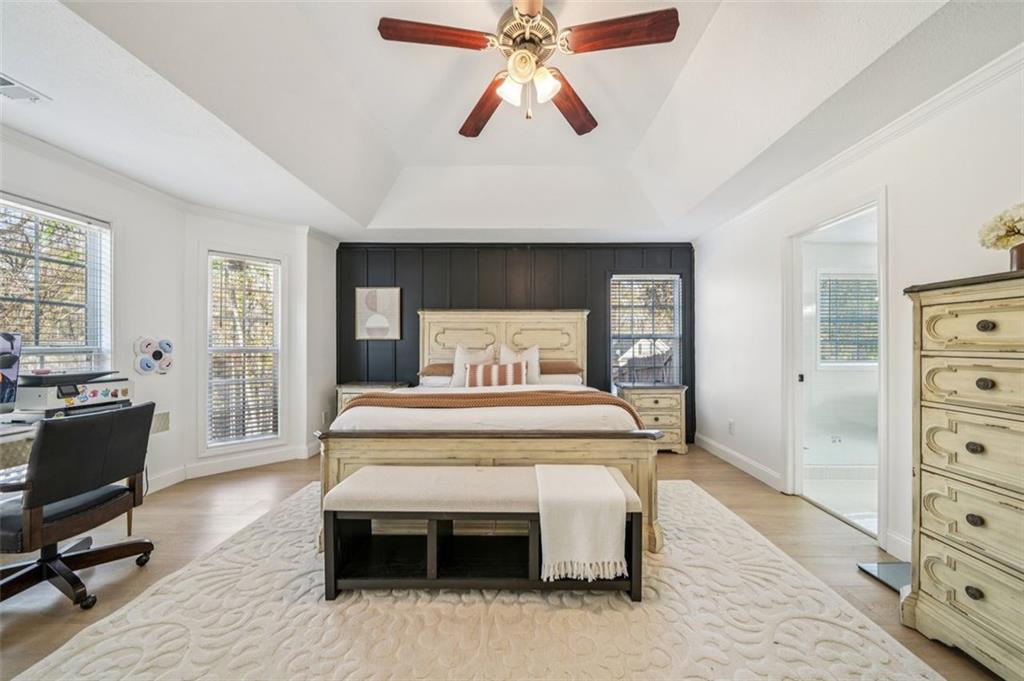 198 Celestial Run Winder, GA 30680 - Photo 18 of 30 a bedroom with a bed and a view of dresser