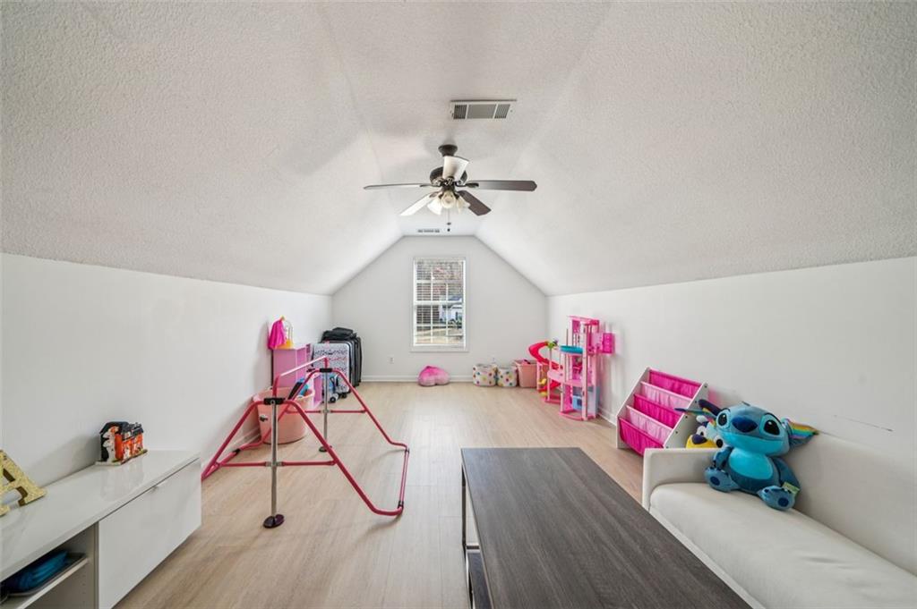 198 Celestial Run Winder, GA 30680 - Photo 22 of 30 a view of a room with gym equipment