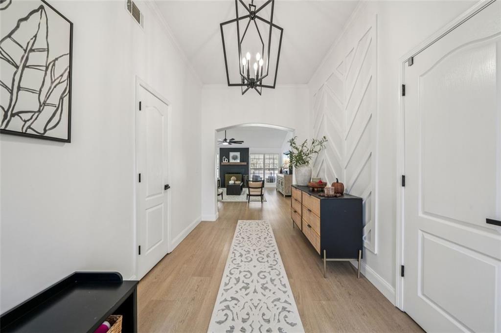 198 Celestial Run Winder, GA 30680 - Photo 23 of 30 a view of a hallway with a livingroom and dining room
