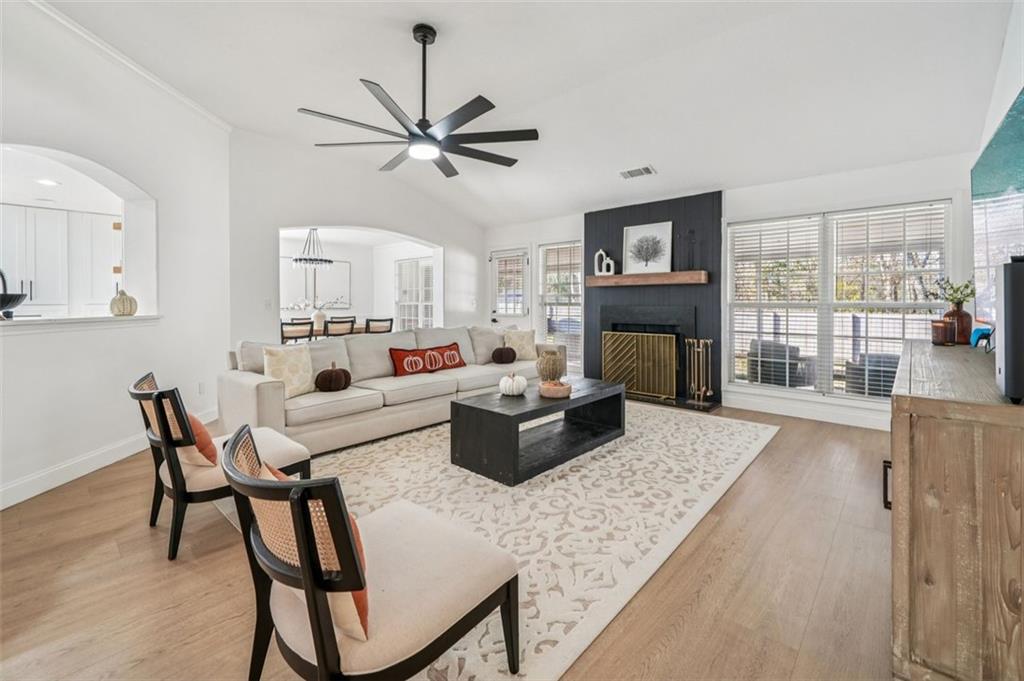 198 Celestial Run Winder, GA 30680 - Photo 9 of 30 a living room with furniture and a fireplace
