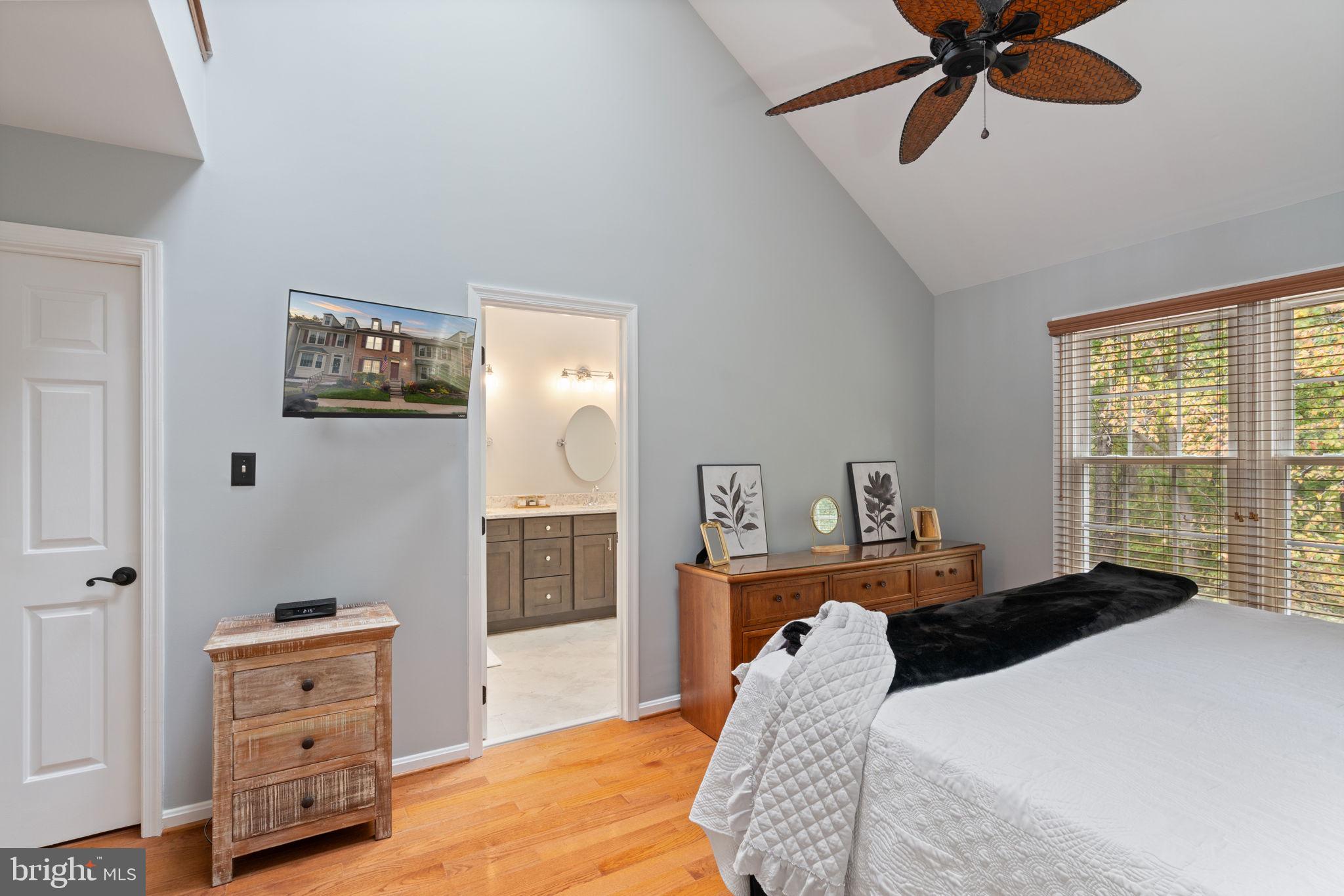 8852 Eagle Rock Lane Springfield, VA 22153 - Photo 19 of 61 a bedroom with a bed and furniture