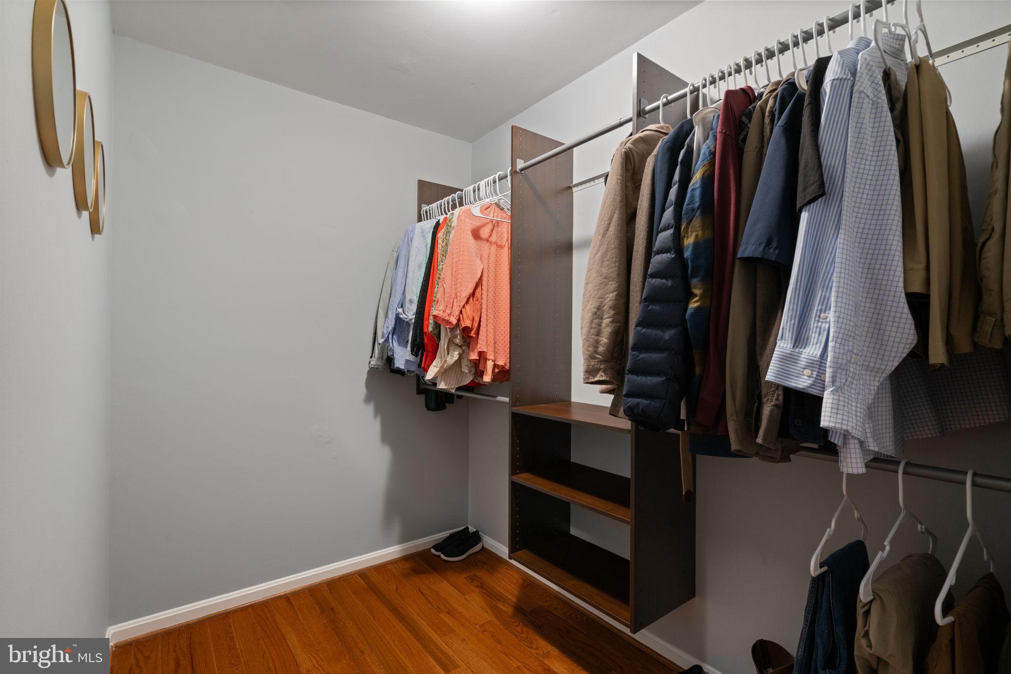 8852 Eagle Rock Lane Springfield, VA 22153 - Photo 24 of 61 a view of walk in closet with clothes and shoes