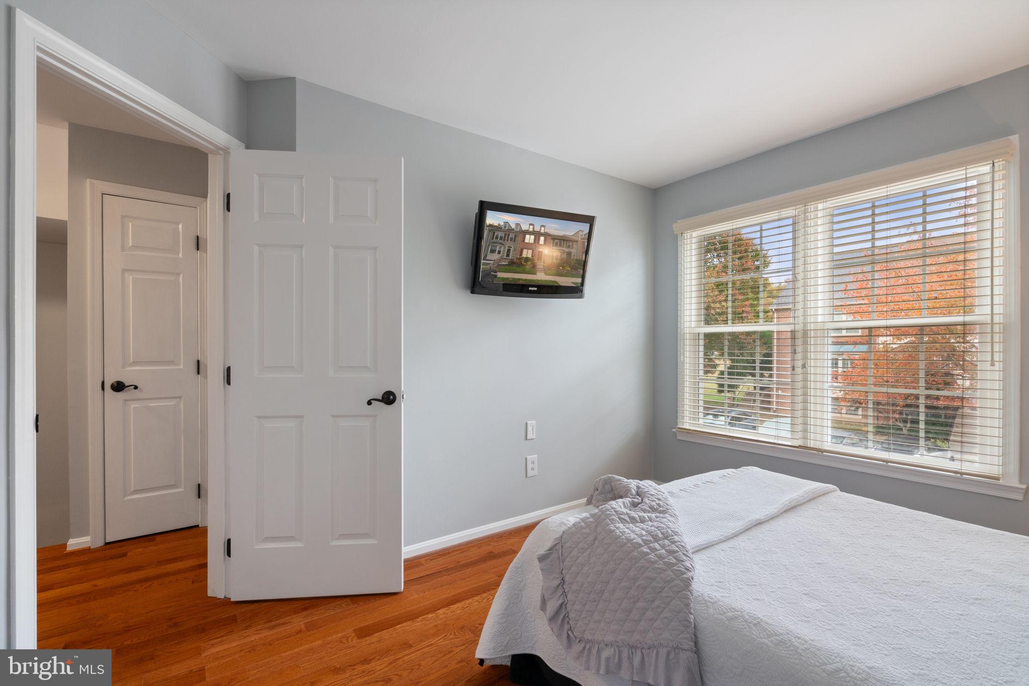 8852 Eagle Rock Lane Springfield, VA 22153 - Photo 27 of 61 a bedroom with a bed and a window