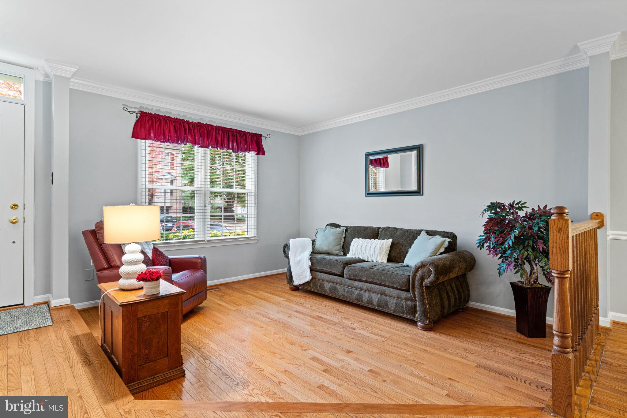 8852 Eagle Rock Lane Springfield, VA 22153 - Photo 5 of 61 a living room with furniture and a window