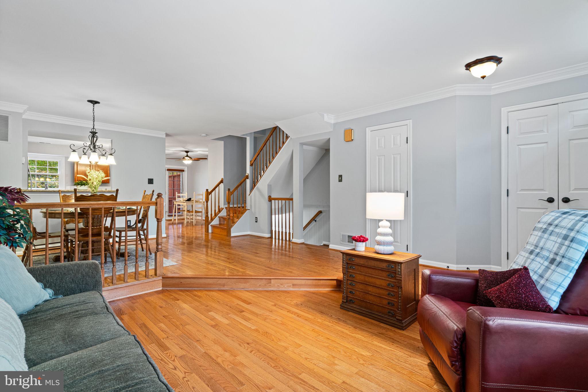 8852 Eagle Rock Lane Springfield, VA 22153 - Photo 6 of 61 a living room with furniture and wooden floor
