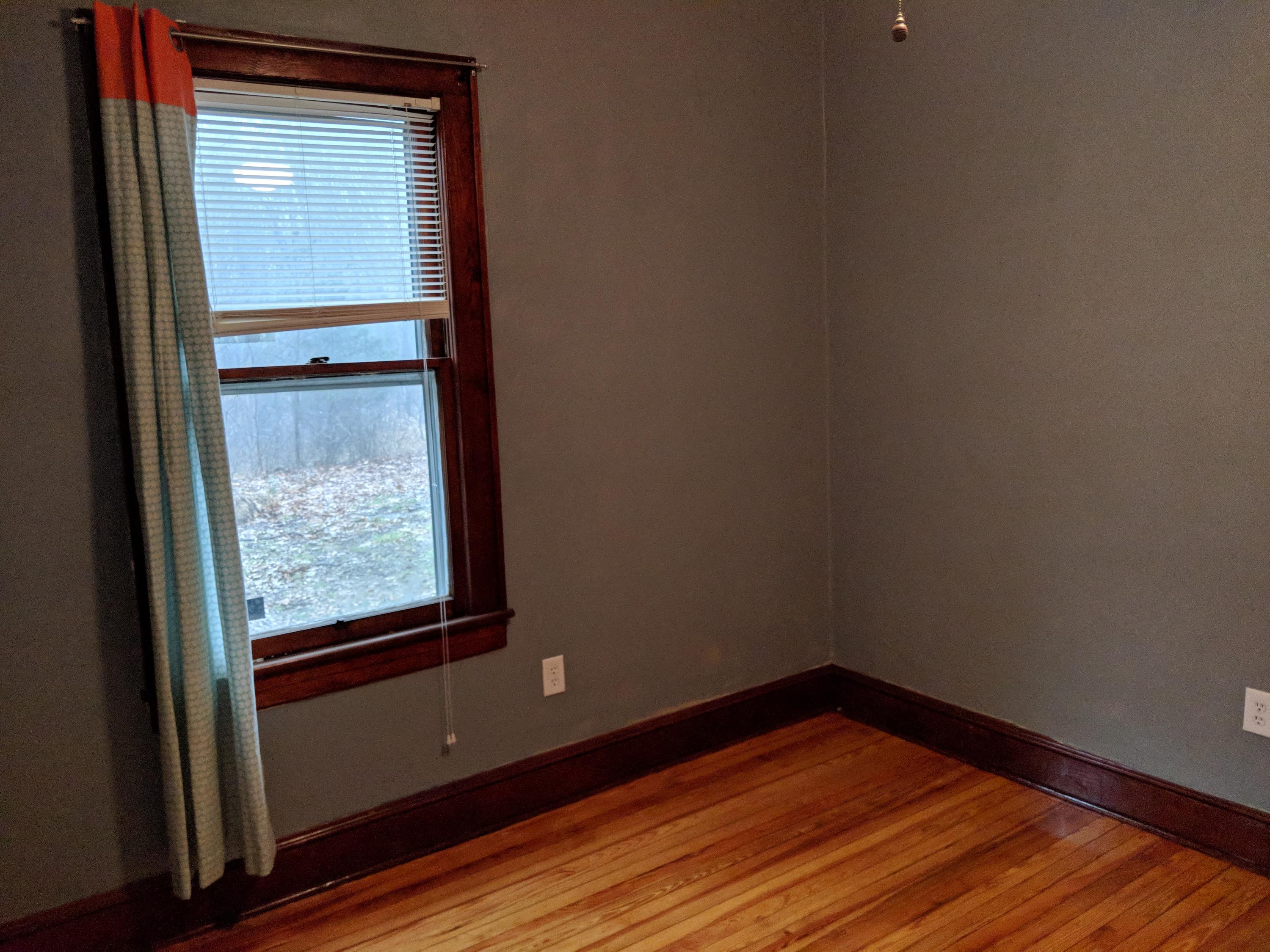 2902 Riverview Road Roanoke, VA 24014 - Photo 9 of 15 a view of empty room with wooden floor and fan