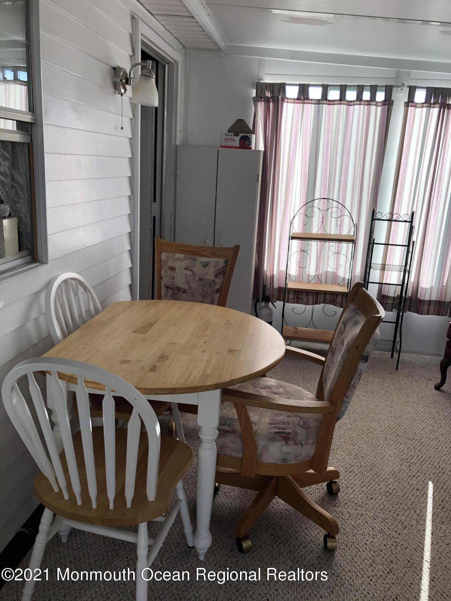 580 Cherin Road Freehold, NJ 07728 - Photo 13 of 23 a view of a dining room with furniture