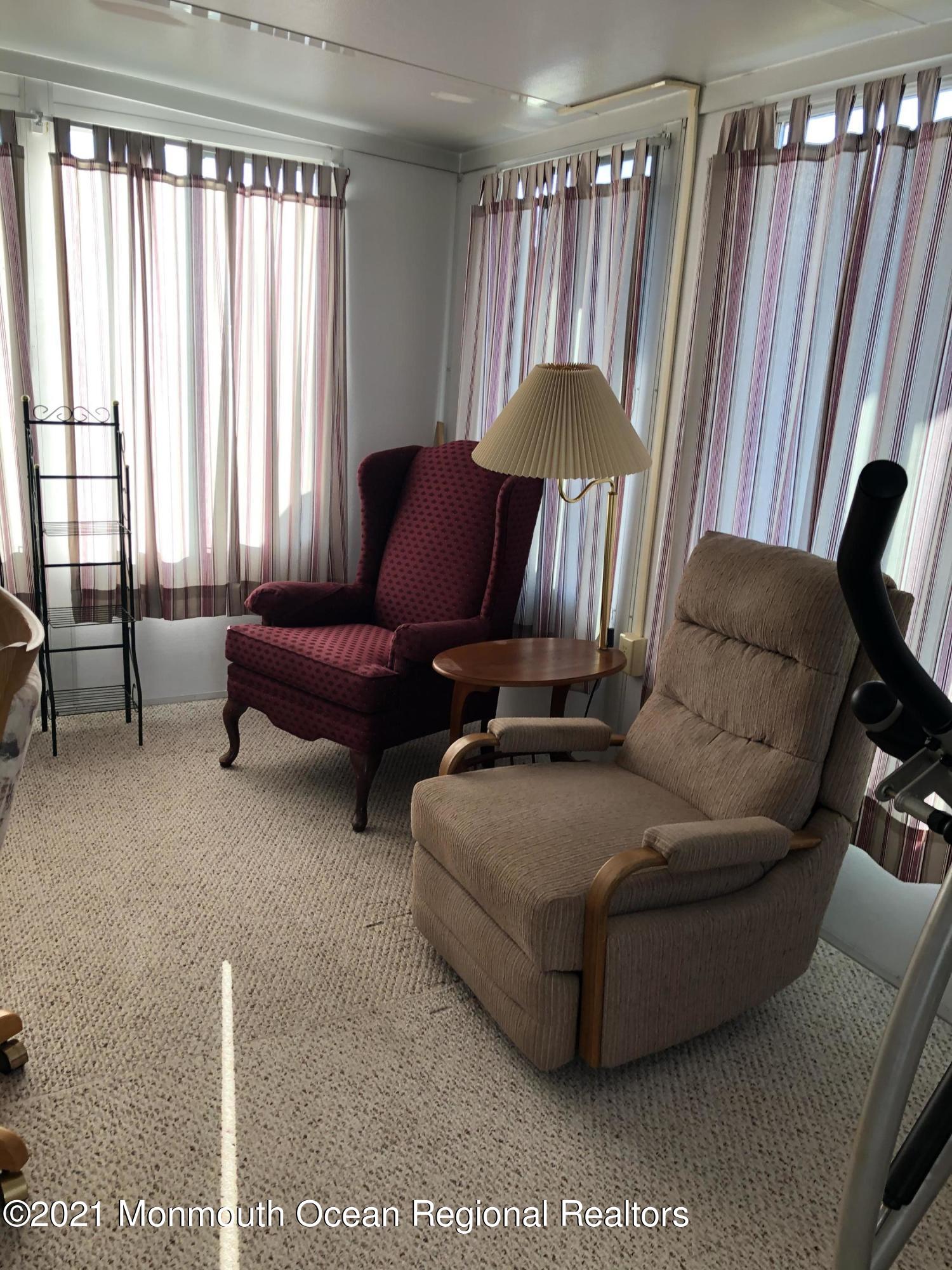 580 Cherin Road Freehold, NJ 07728 - Photo 14 of 23 a living room with furniture and a window