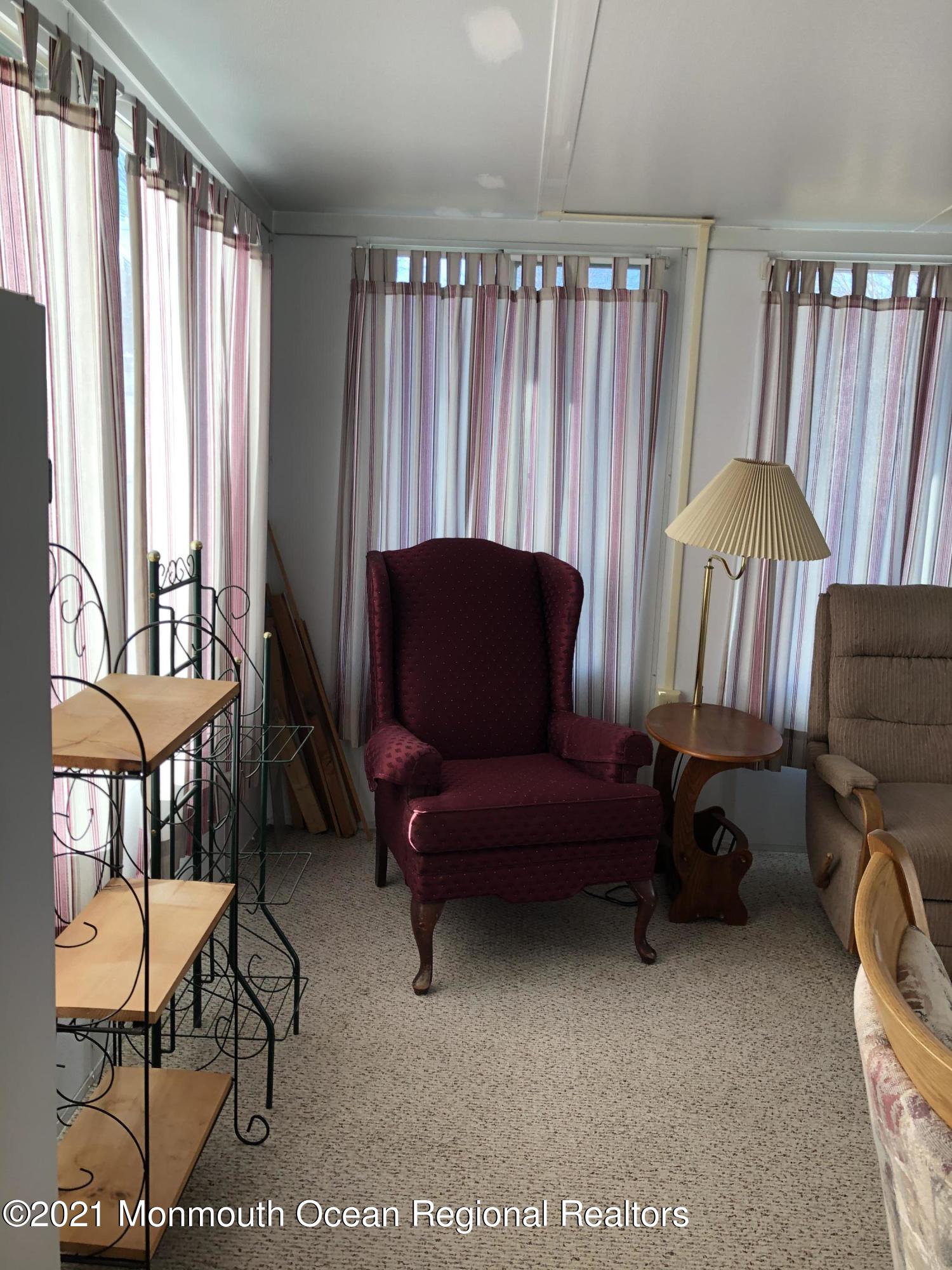 580 Cherin Road Freehold, NJ 07728 - Photo 15 of 23 a living room with furniture and a window