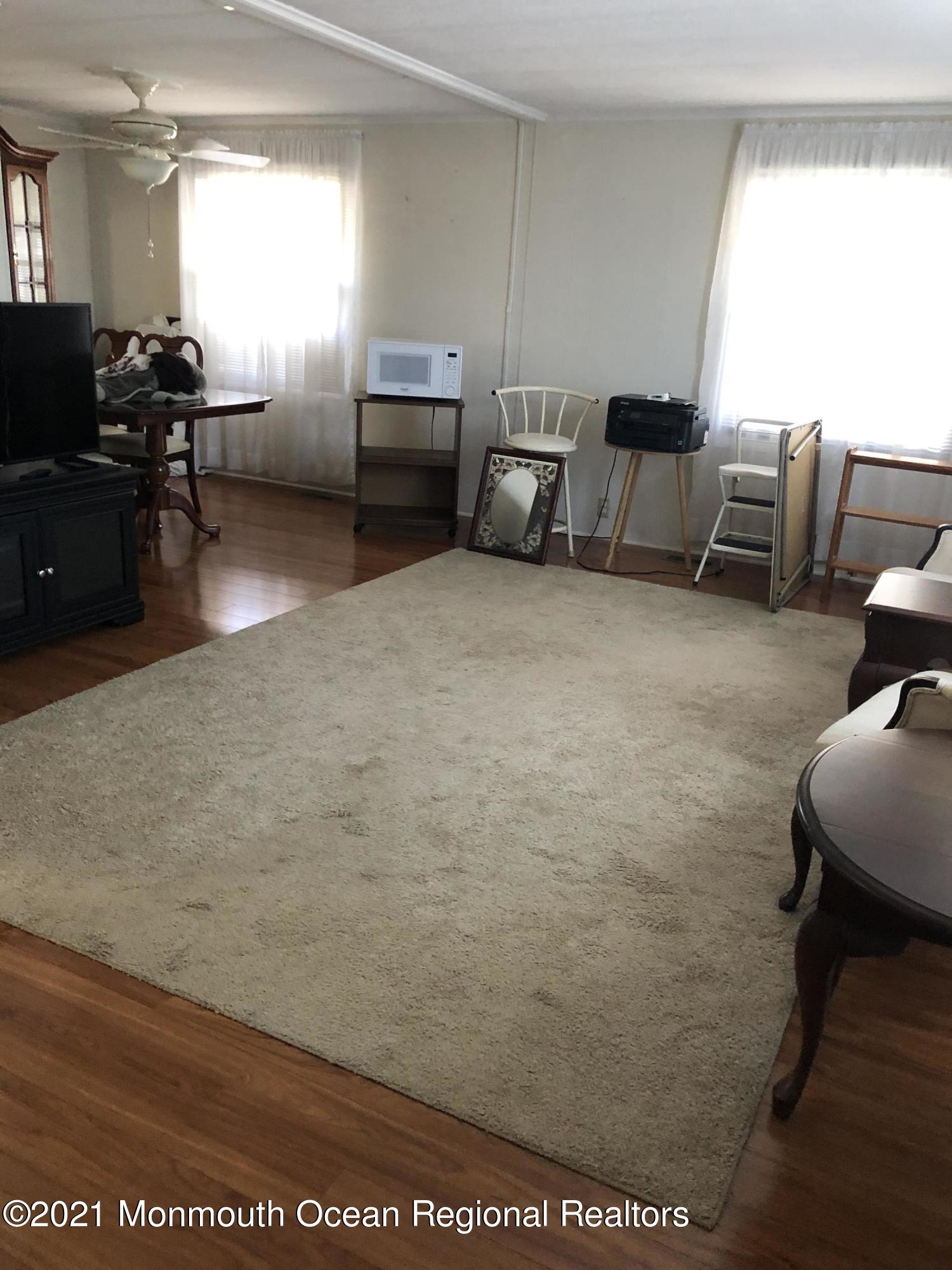 580 Cherin Road Freehold, NJ 07728 - Photo 4 of 23 a living room with furniture