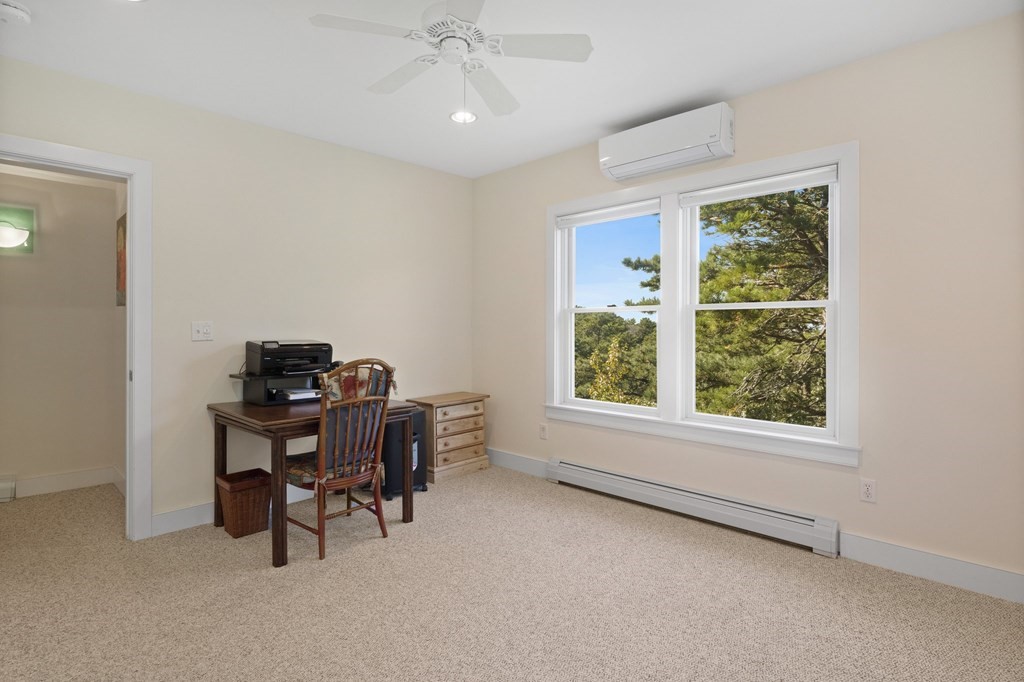 6 Chickadee Lane Truro, MA 02666 - Photo 34 of 42 a view of a workspace with furniture and a window