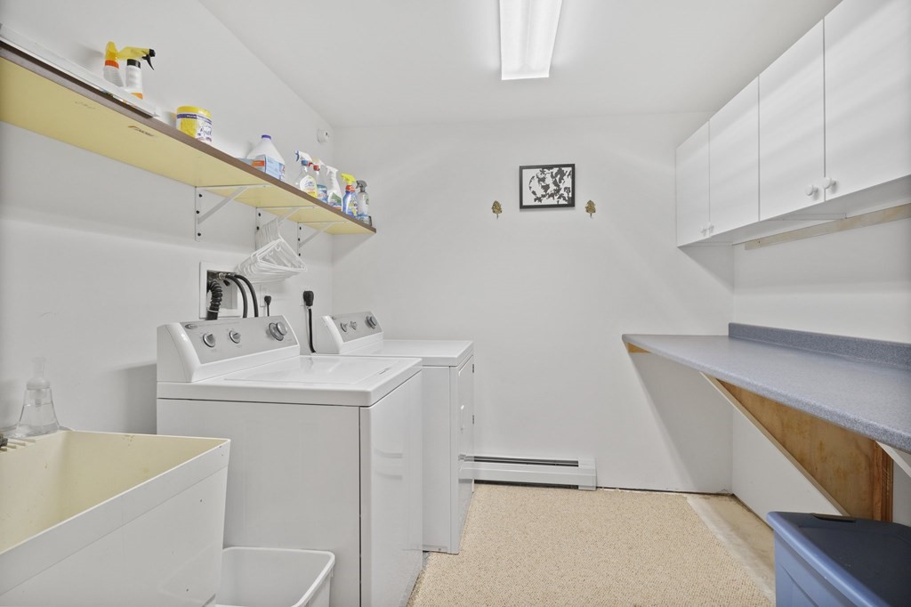 6 Chickadee Lane Truro, MA 02666 - Photo 40 of 42 a bathroom with a sink a toilet and tub