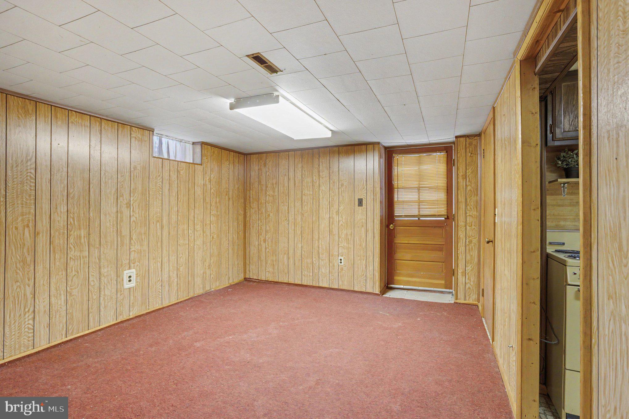 7437 New Cut Road Kingsville, MD 21087 - Photo 25 of 37 LL Living Room w/ Exterior Access & Full Bathrm