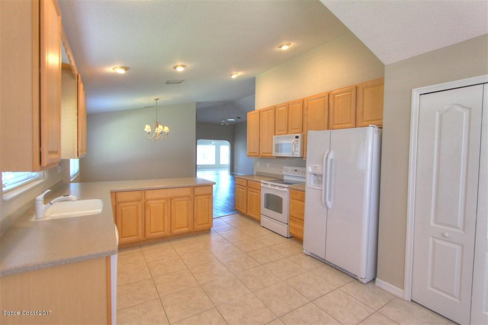 3353 Siderwheel Drive Rockledge, FL 32955 - Photo 7 of 30 IMG_1579_80_81_Smooth 3