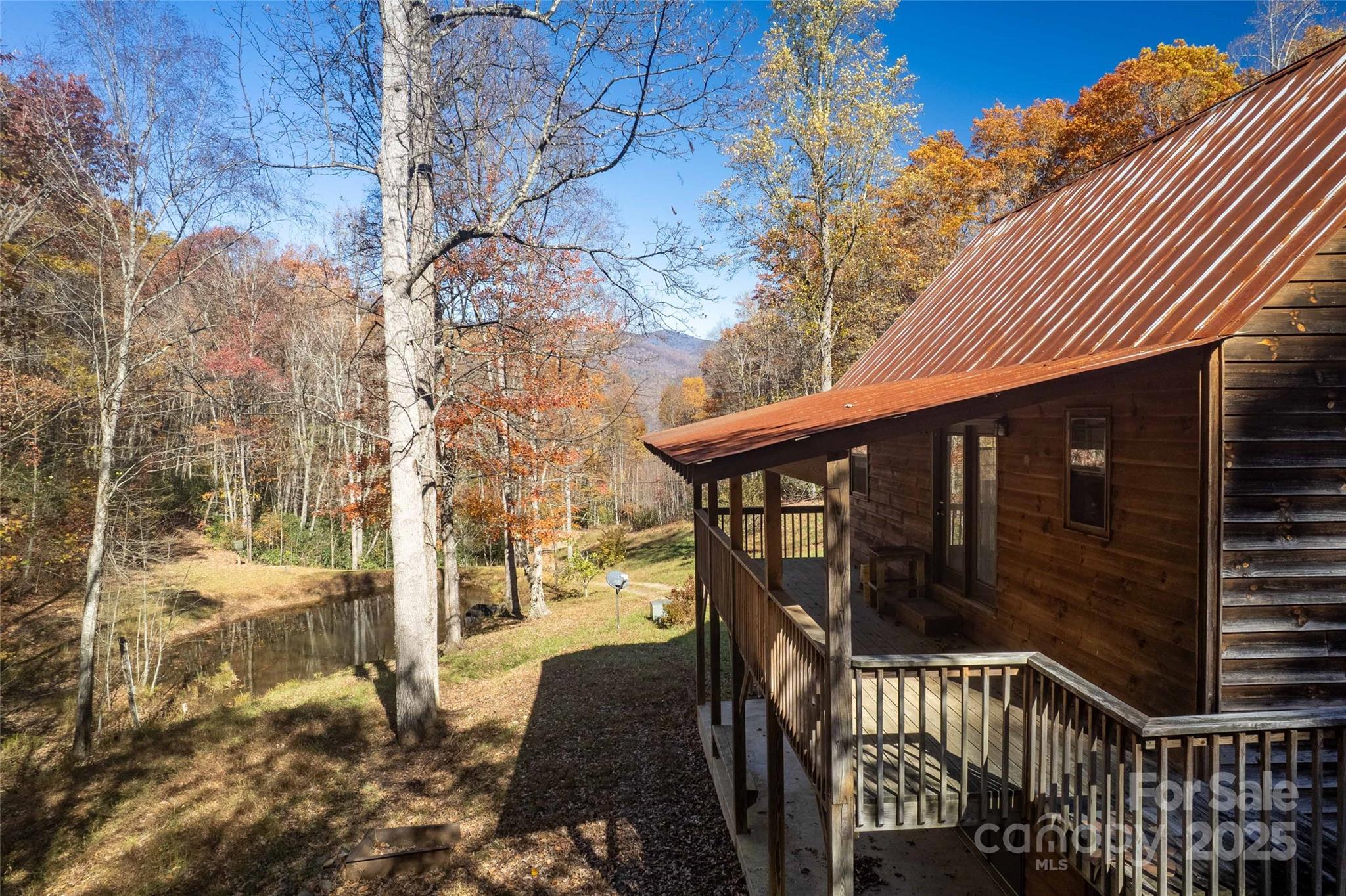 a view of balcony with wooden floor