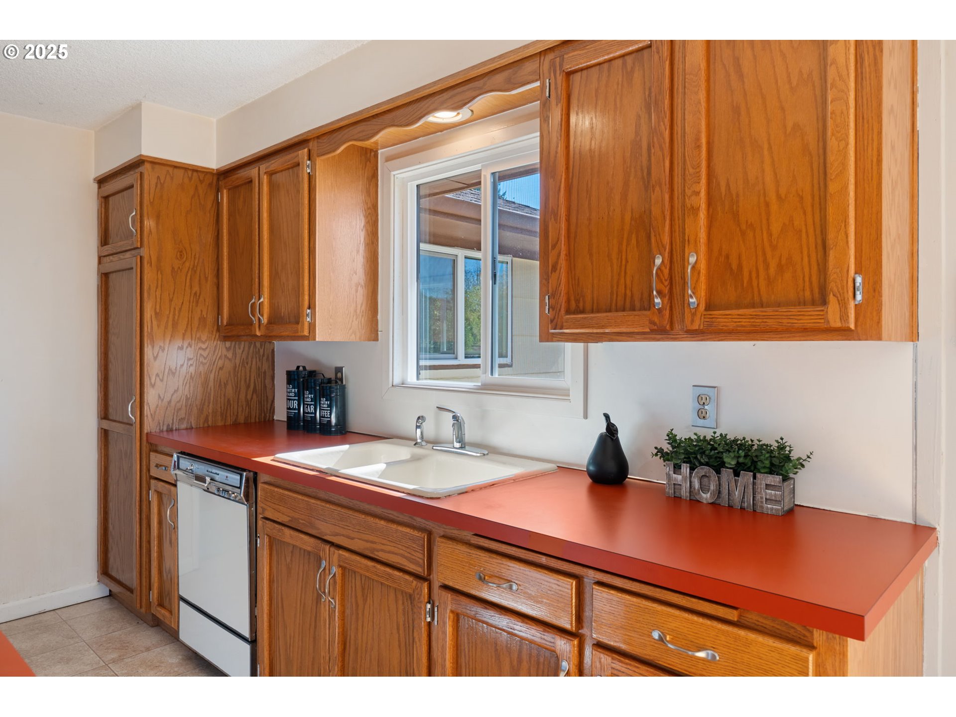 122 Armstrong Road Chehalis, WA 98532 - Photo 13 of 40 a kitchen with stainless steel appliances granite countertop a sink a refrigerator and cabinets
