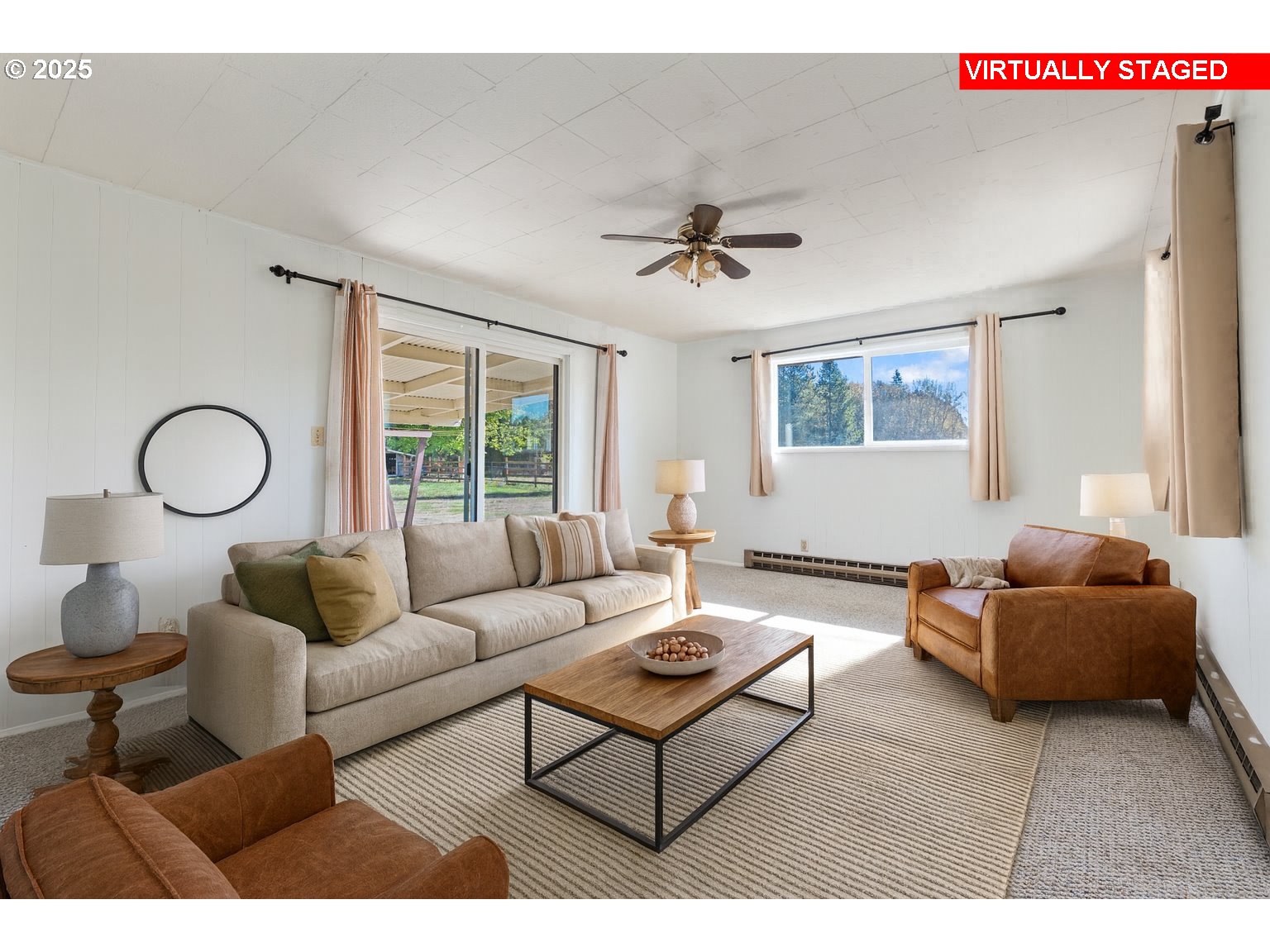 122 Armstrong Road Chehalis, WA 98532 - Photo 18 of 40 a living room with furniture a large window and a chandelier