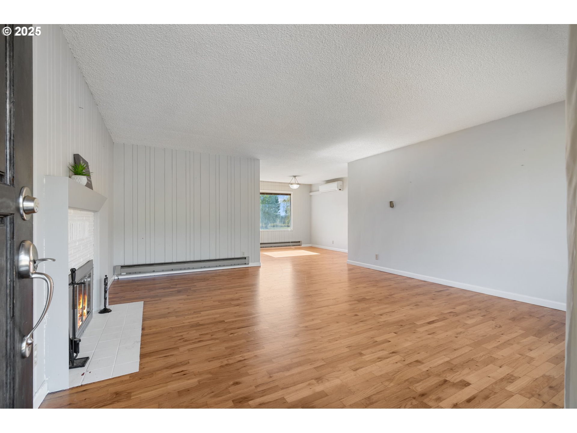 122 Armstrong Road Chehalis, WA 98532 - Photo 5 of 40 a view of empty room with wooden floor