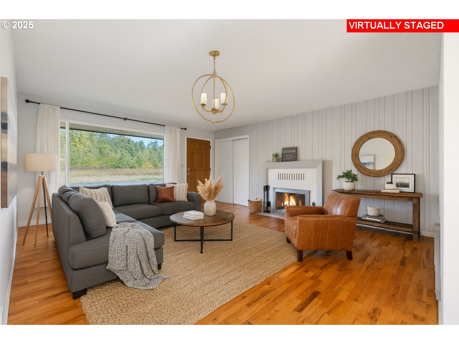122 Armstrong Road Chehalis, WA 98532 - Photo 7 of 40 a living room with furniture a fireplace and a large window