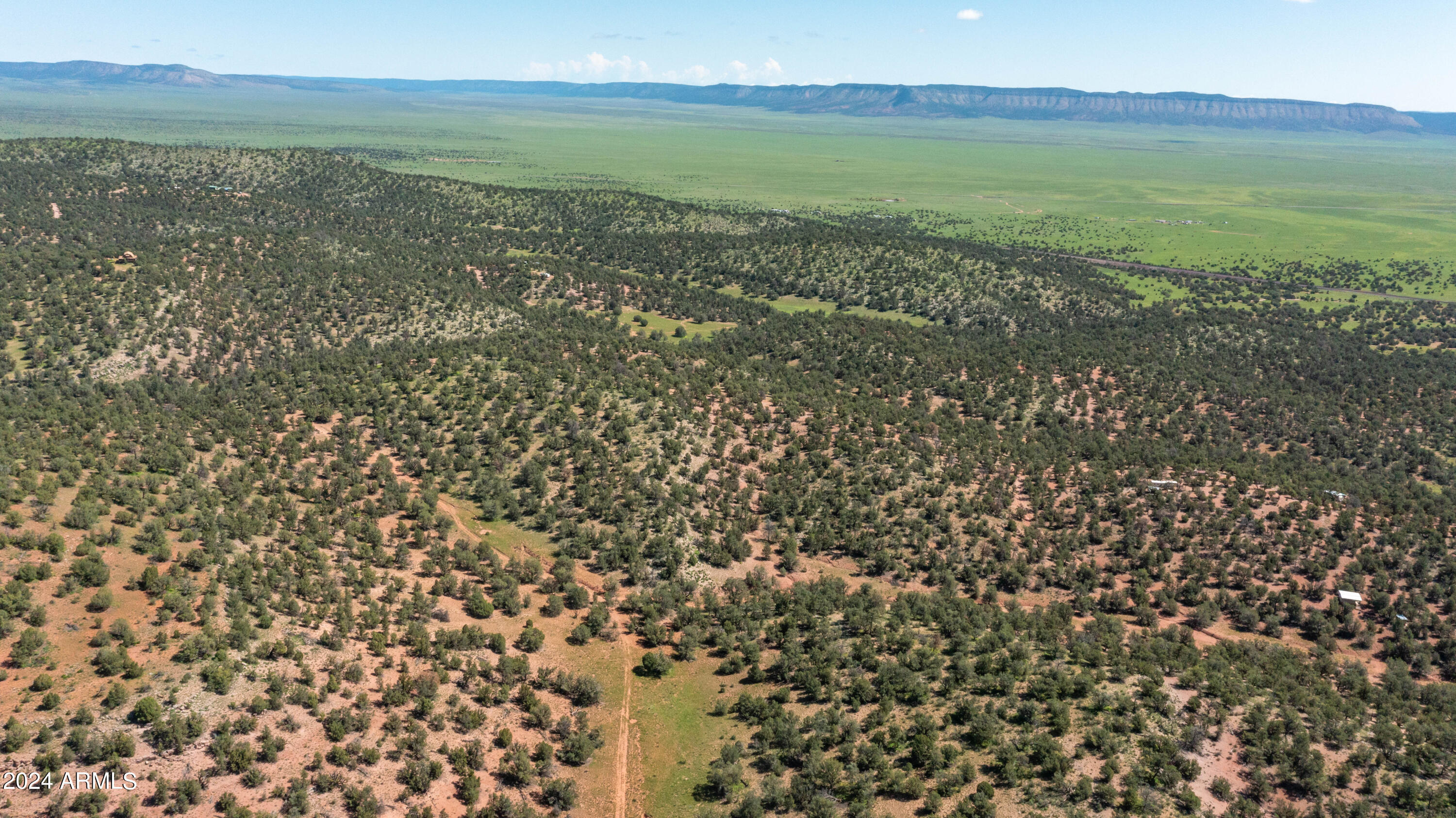 39.93-acre West 39.93-acre W Titan Ranch Road, Unit 318 Seligman, AZ 86337 - Photo 9 of 17 a view of an ocean from a yard