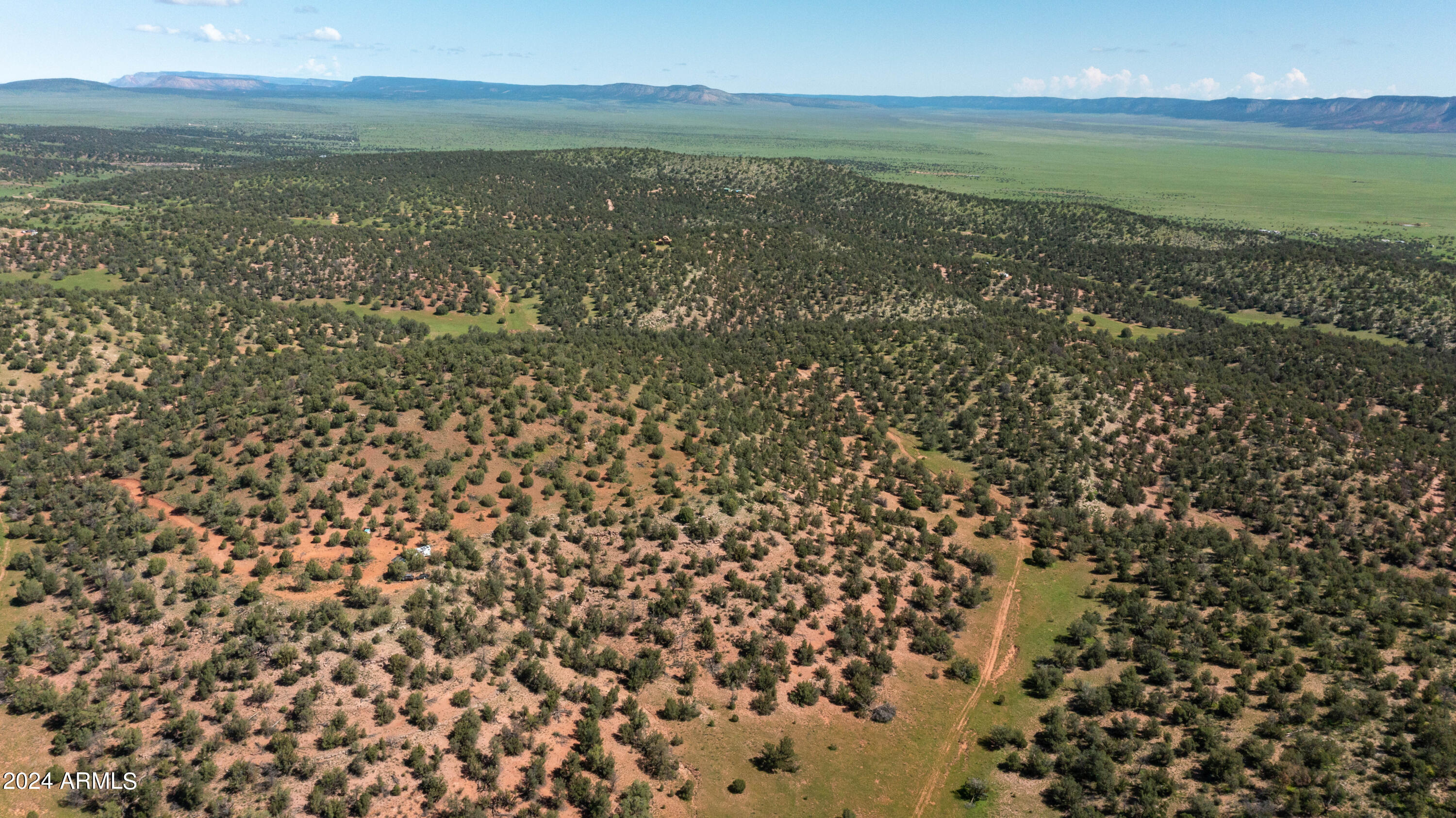 39.93-acre West 39.93-acre W Titan Ranch Road, Unit 318 Seligman, AZ 86337 - Photo 10 of 17 a view of an ocean from a yard