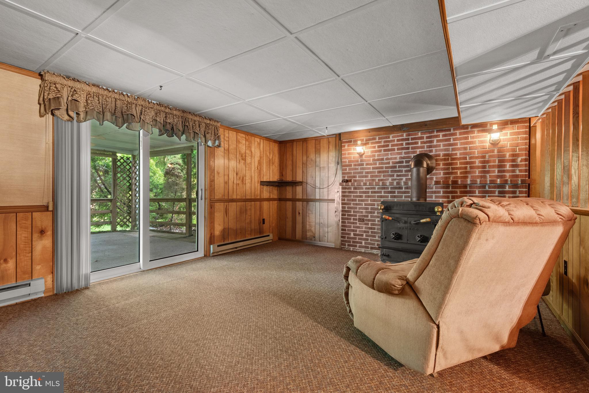 620 Kinderhook Road Columbia, PA 17512 - Photo 22 of 43 Family room with a working wood stove