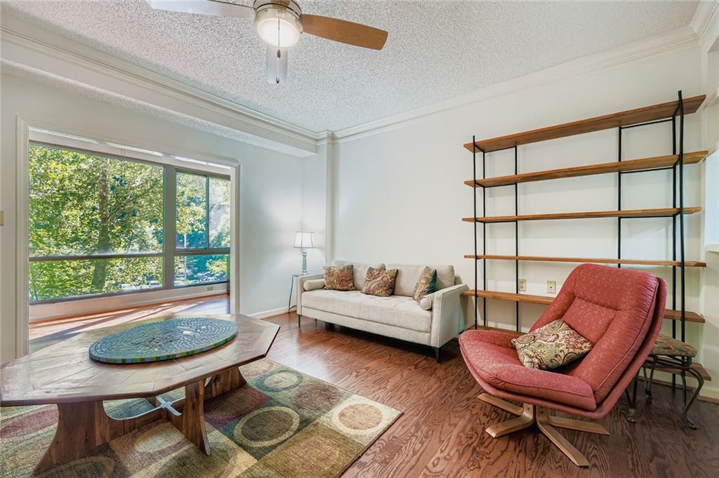 1800 Clairmont Lake, Unit A325 Decatur, GA 30033 - Photo 2 of 51 a living room with furniture and a window