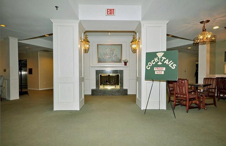 1800 Clairmont Lake, Unit A325 Decatur, GA 30033 - Photo 37 of 51 a view of a livingroom with furniture and a fireplace