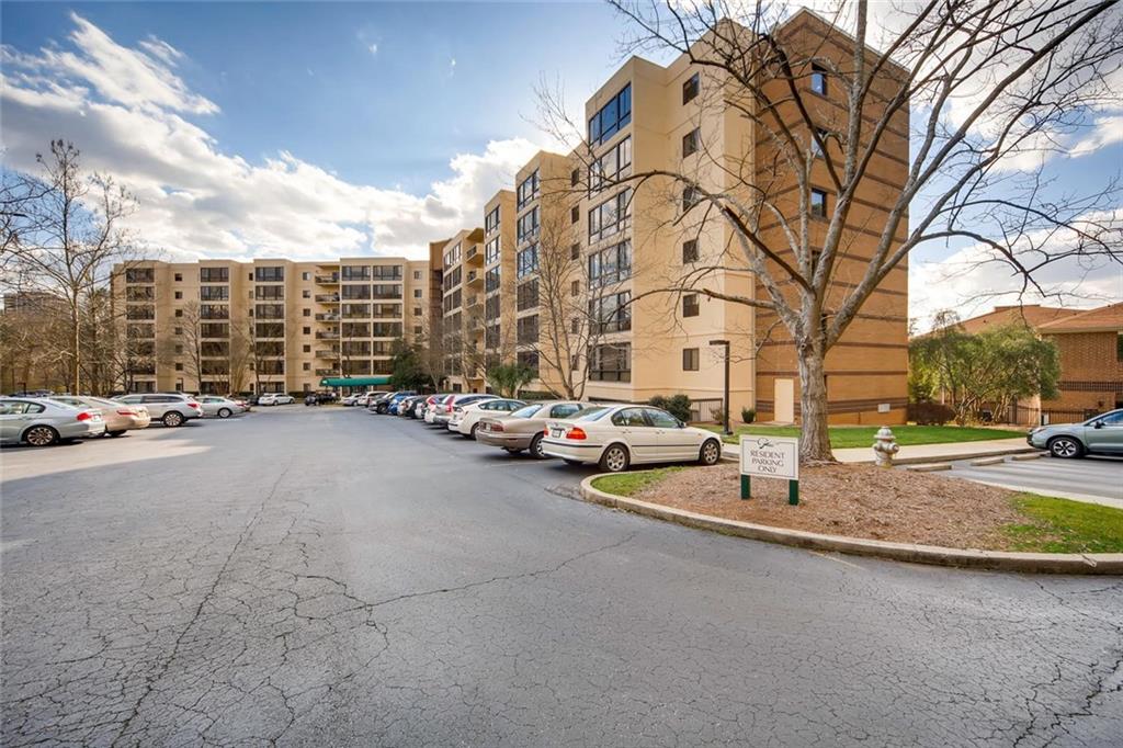 1800 Clairmont Lake, Unit A325 Decatur, GA 30033 - Photo 42 of 51 a view of a street with a building in the background