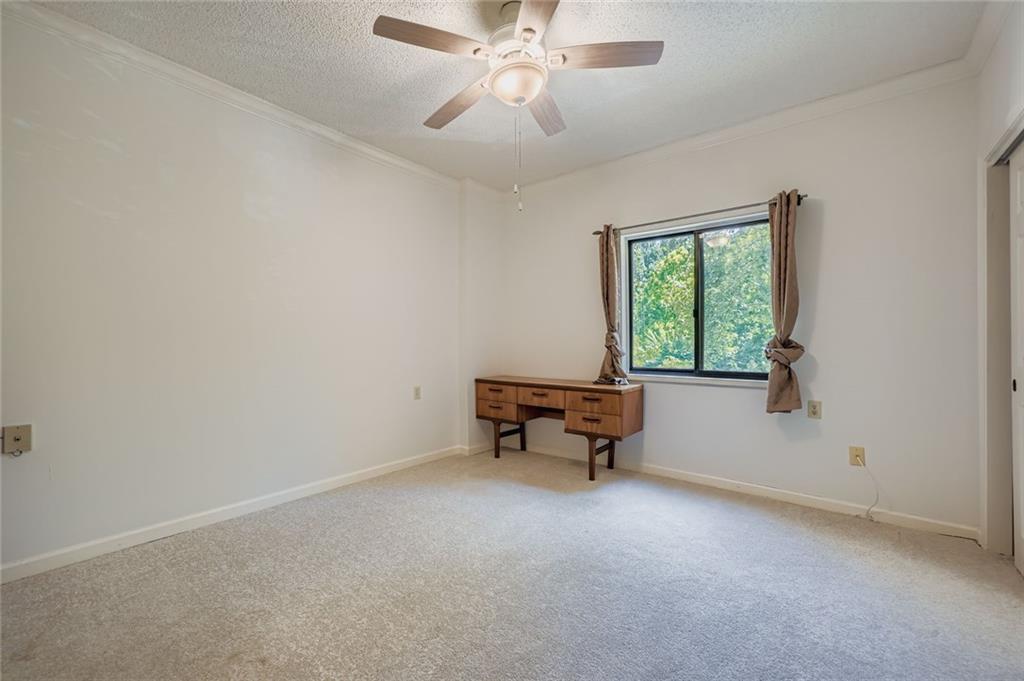 1800 Clairmont Lake, Unit A325 Decatur, GA 30033 - Photo 10 of 51 a view of room with window and ceiling fan