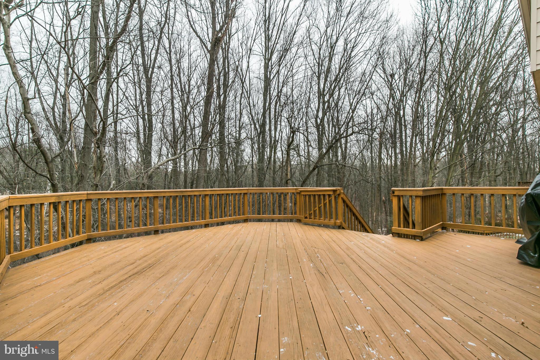 10710 Cross School Road Reston, VA 20191 - Photo 3 of 7 a view of balcony with wooden floor and fence