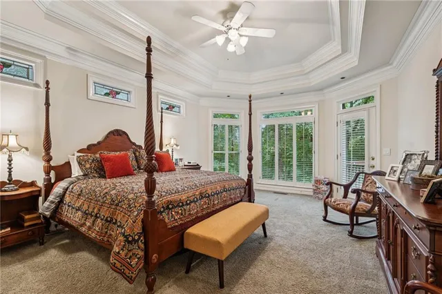 a bathroom with a bathtub and a window
