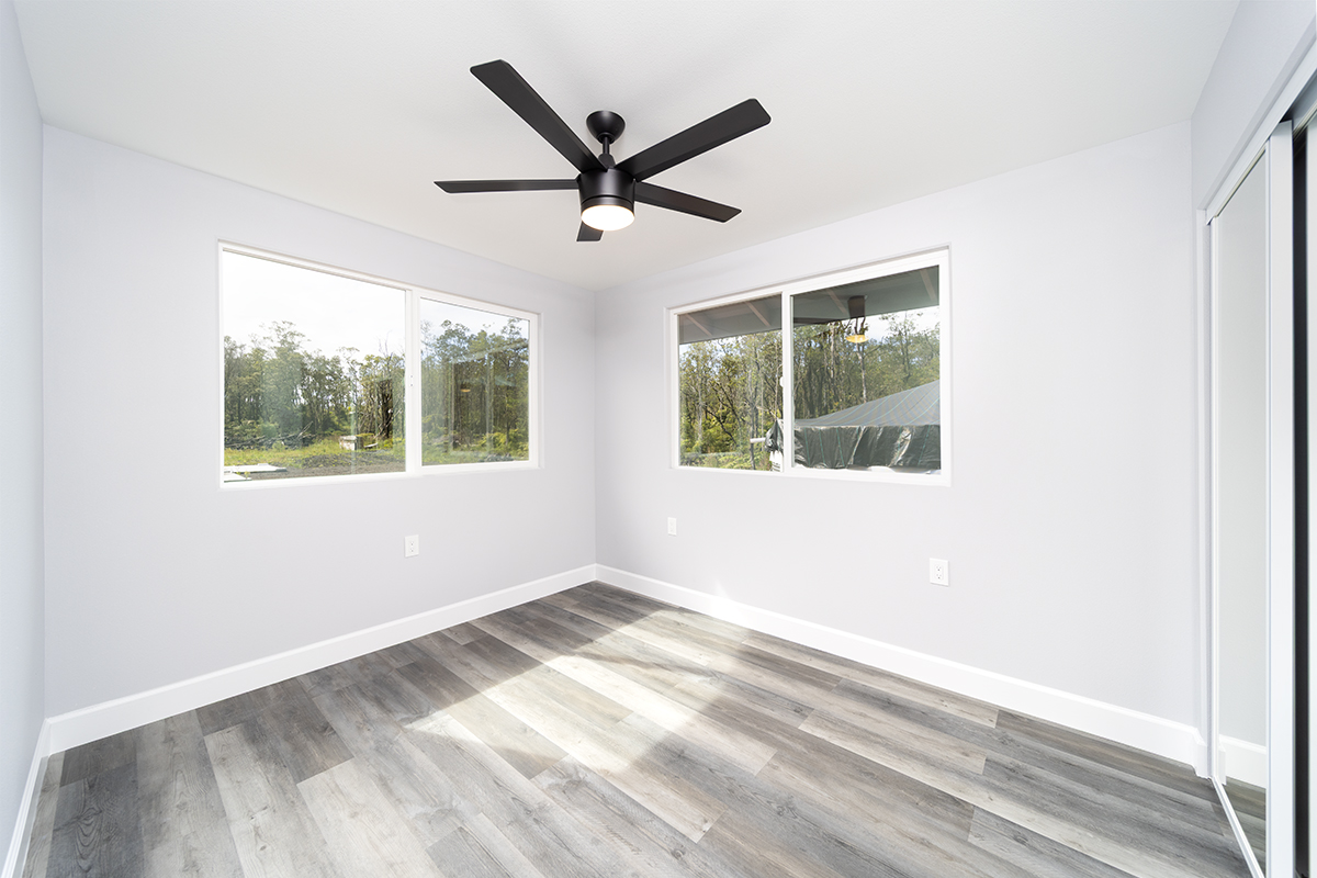 11-3115 Mokuna Street Mountain View, HI 96771 - Photo 22 of 30 a view of a ceiling fan and a window