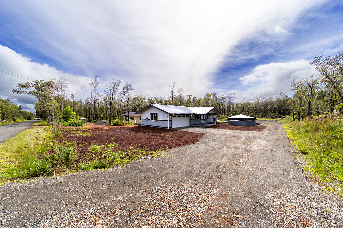 11-3115 Mokuna Street Mountain View, HI 96771 - Photo 5 of 30 a car parked on the side of the road