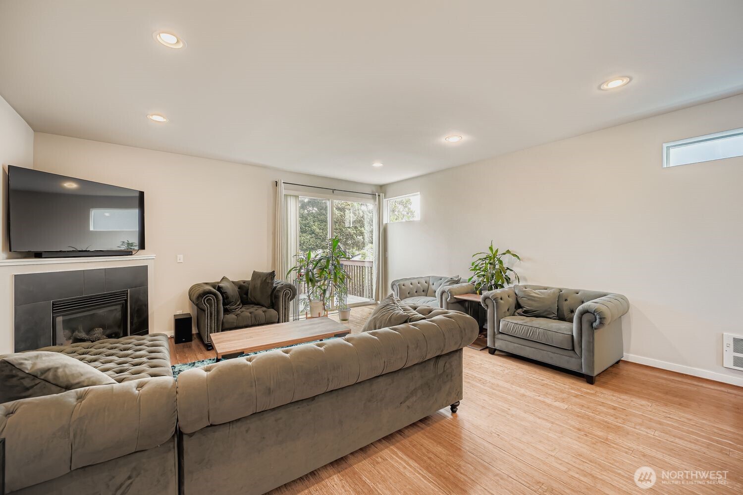 12420 2nd Place Southwest Seattle, WA 98146 - Photo 12 of 31 a living room with fireplace furniture and a flat screen tv