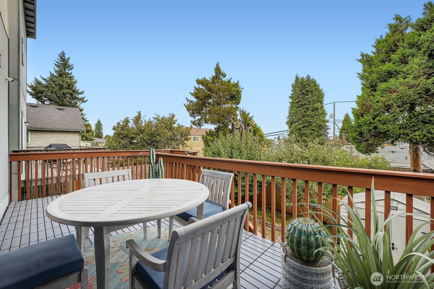 12420 2nd Place Southwest Seattle, WA 98146 - Photo 14 of 31 a view of a wooden bench on the roof deck
