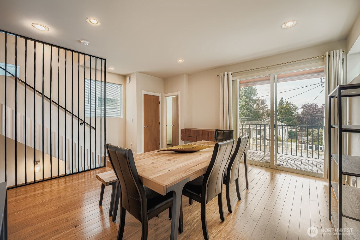 12420 2nd Place Southwest Seattle, WA 98146 - Photo 17 of 31 a view of a dining room with furniture window and wooden floor