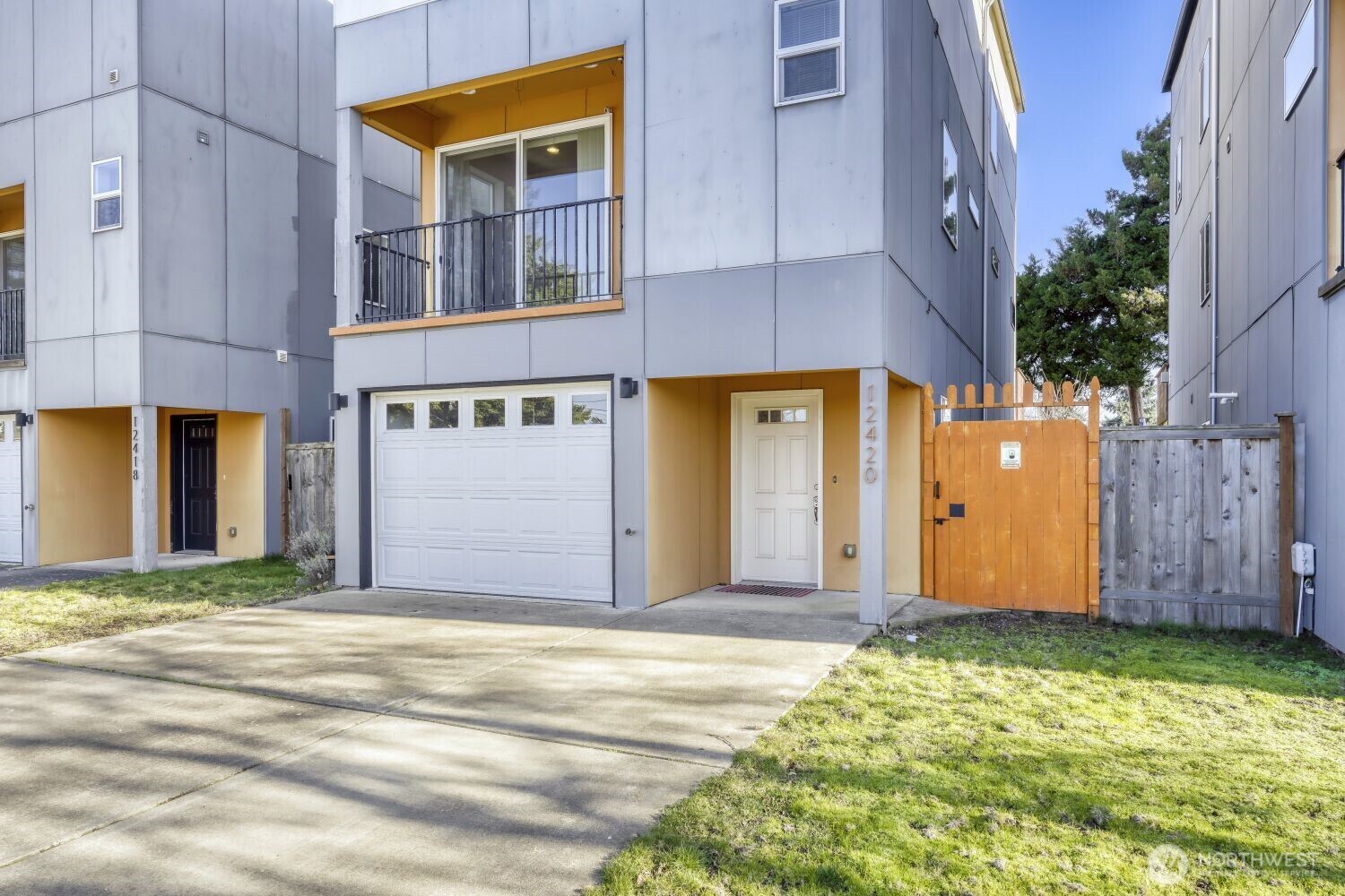 12420 2nd Place Southwest Seattle, WA 98146 - Photo 2 of 31 a front view of a house with a garden