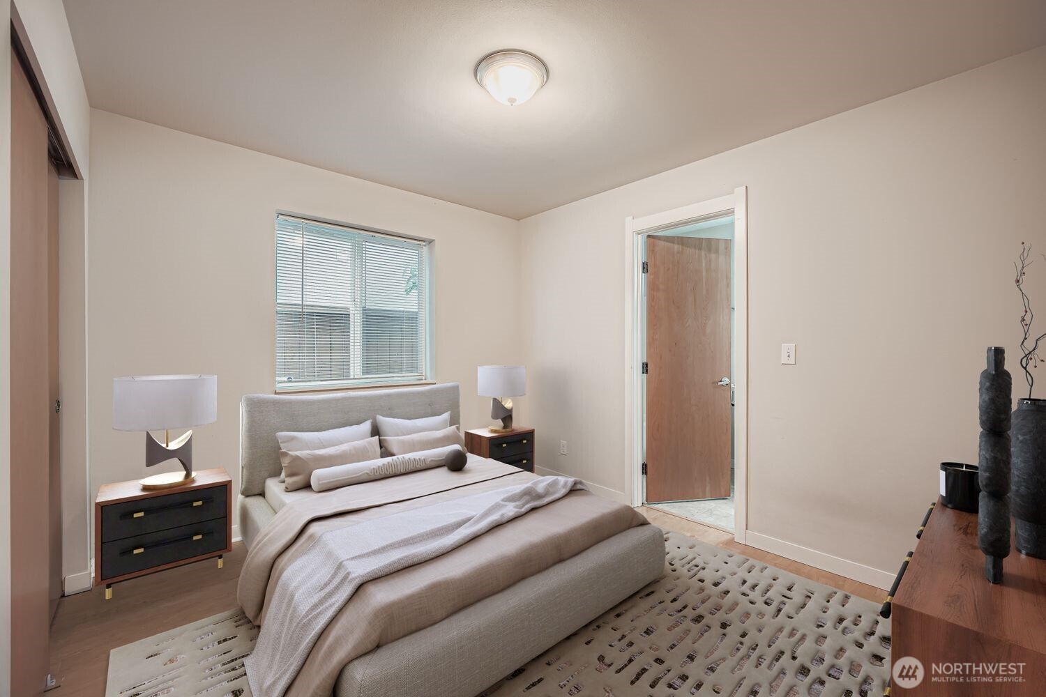 12420 2nd Place Southwest Seattle, WA 98146 - Photo 4 of 31 a bedroom with a bed and a window