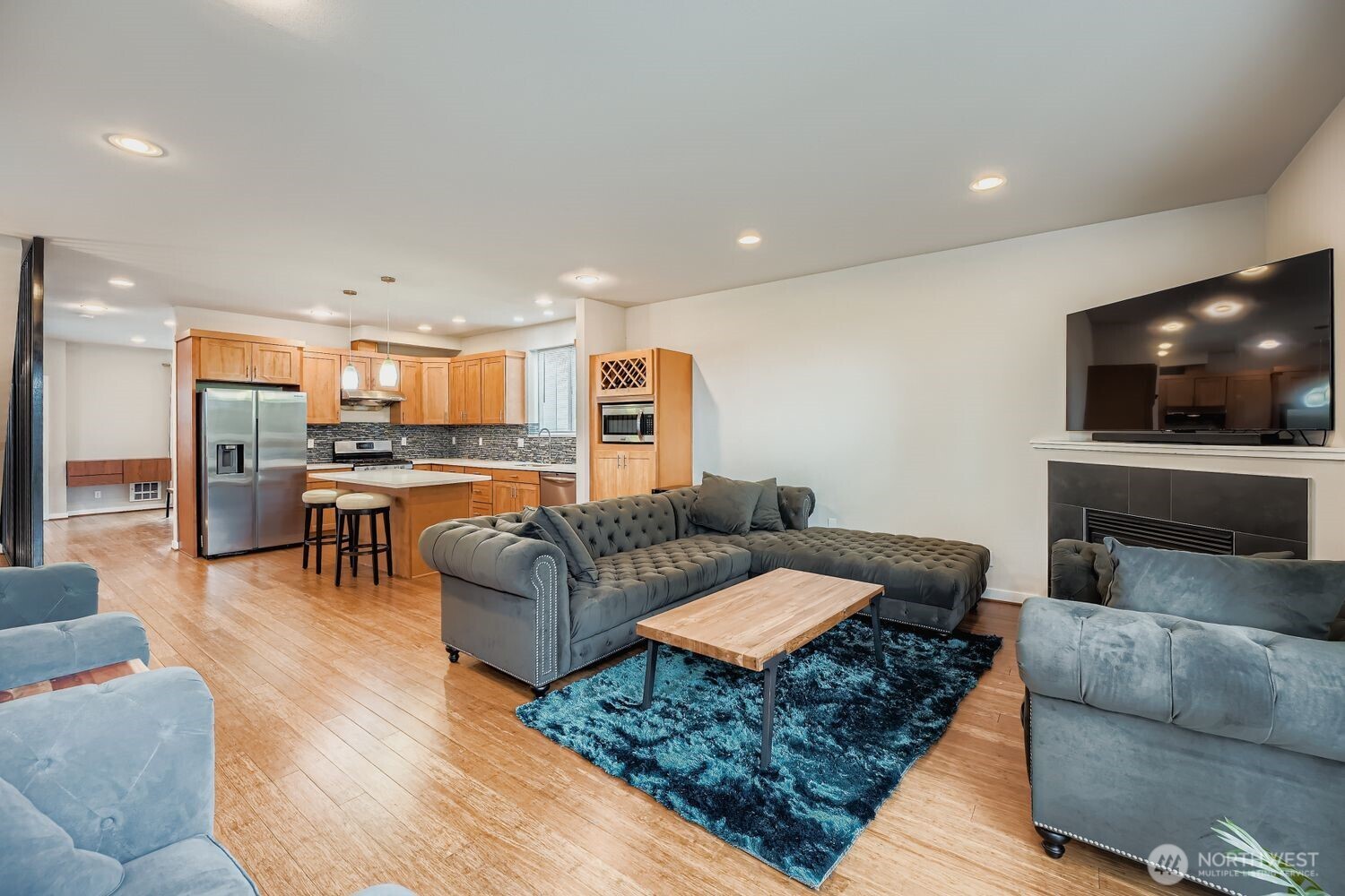 12420 2nd Place Southwest Seattle, WA 98146 - Photo 10 of 31 a living room with furniture and a flat screen tv
