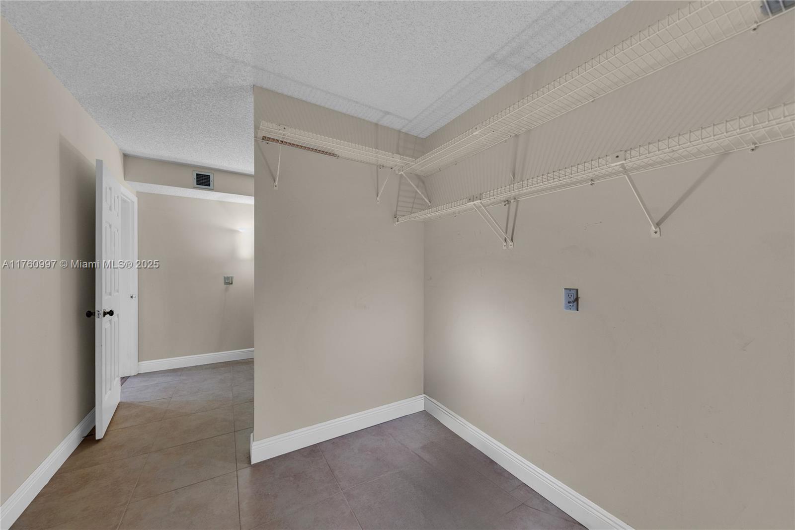 6025 Balboa Circle, Unit 204 Boca Raton, FL 33433 - Photo 23 of 38 a view of an empty room